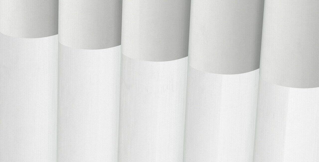 White window blinds with a smooth texture, vertical orientation, and subtle shading, ideal for modern interior decor and privacy.