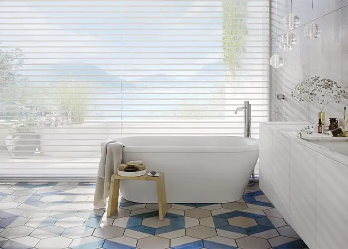 Bright bathroom with sleek freestanding bathtub, natural light, and contemporary decor. Relaxing spa-inspired ambiance perfect for home wellness.