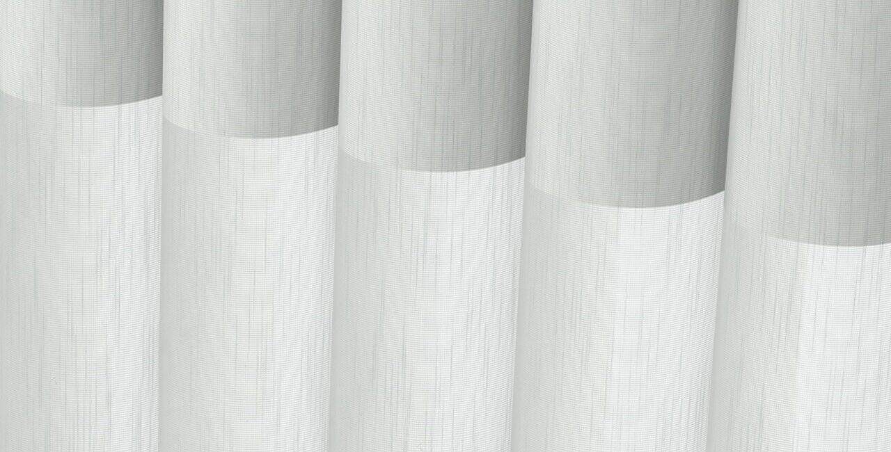 Close-up of Luminette® sheer window panels showcasing light-filtering fabric and elegant design.
