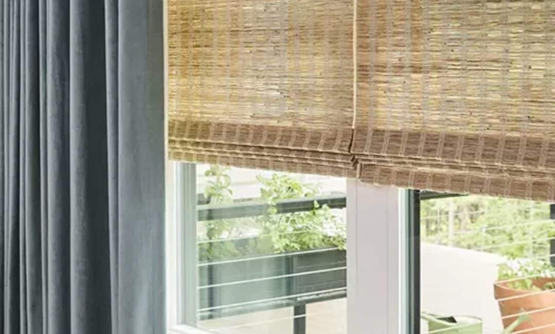 Light-filtering bamboo and black blackout curtains for windows.