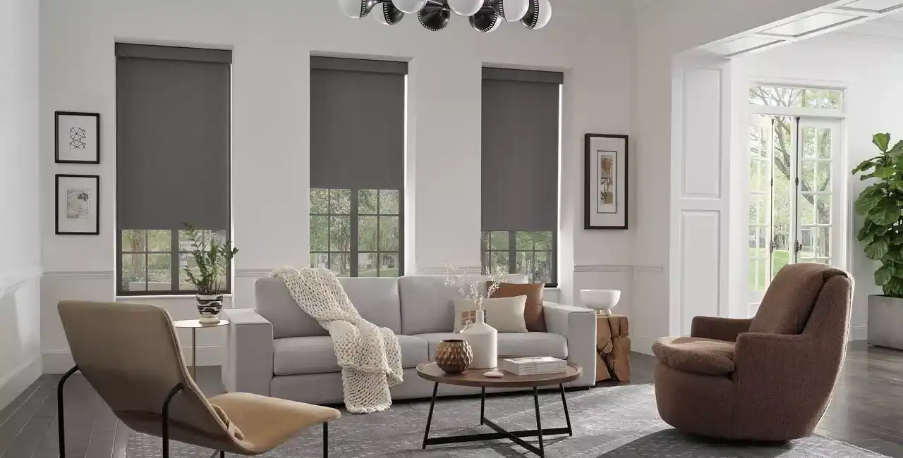 Bright and airy living space featuring neutral decor, large windows, cozy seating, and contemporary accents. Ideal for relaxation and social gatherings.
