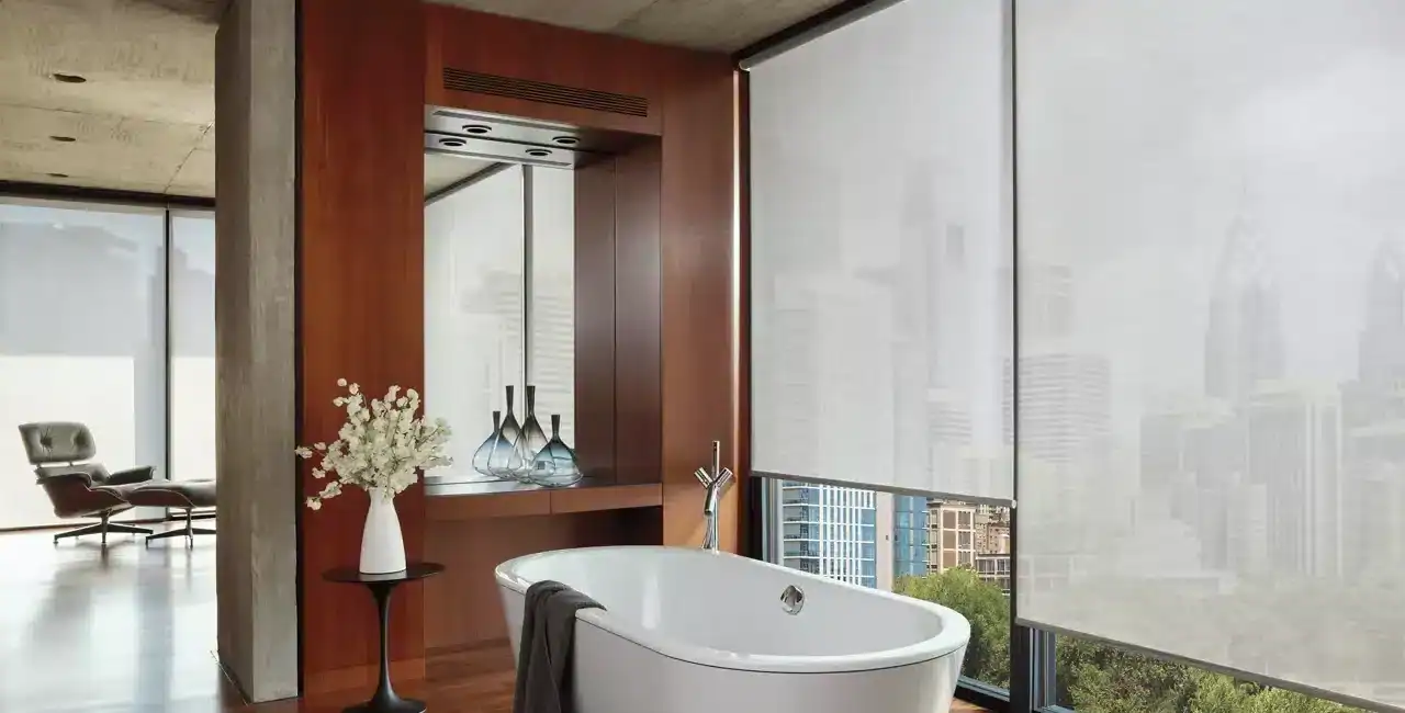 Bright and luxurious bathroom with freestanding bathtub and city skyline views, wooden flooring, decorative vases, and minimalist decor in urban high-rise living space.