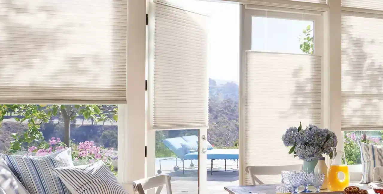 Kitchen patio door with cellular shades installed