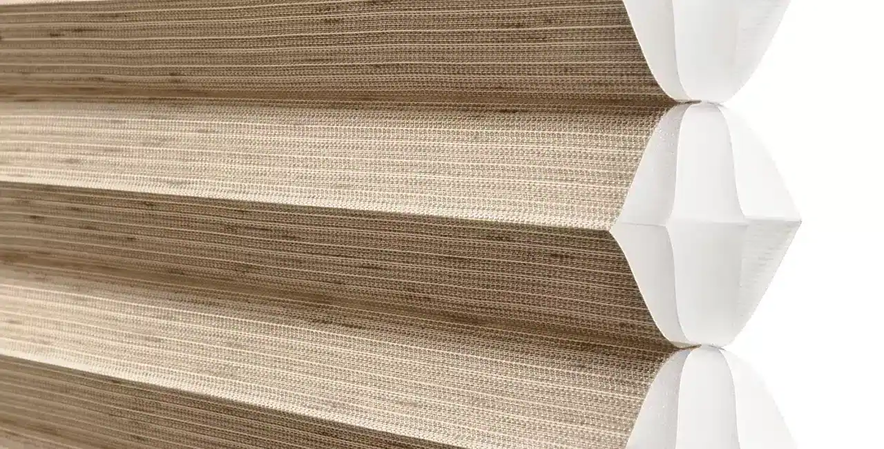 Corrugated cardboard boxes stacked with white edges, beige appearance, strong durable packaging, ideal for shipping, storage, and industrial use.