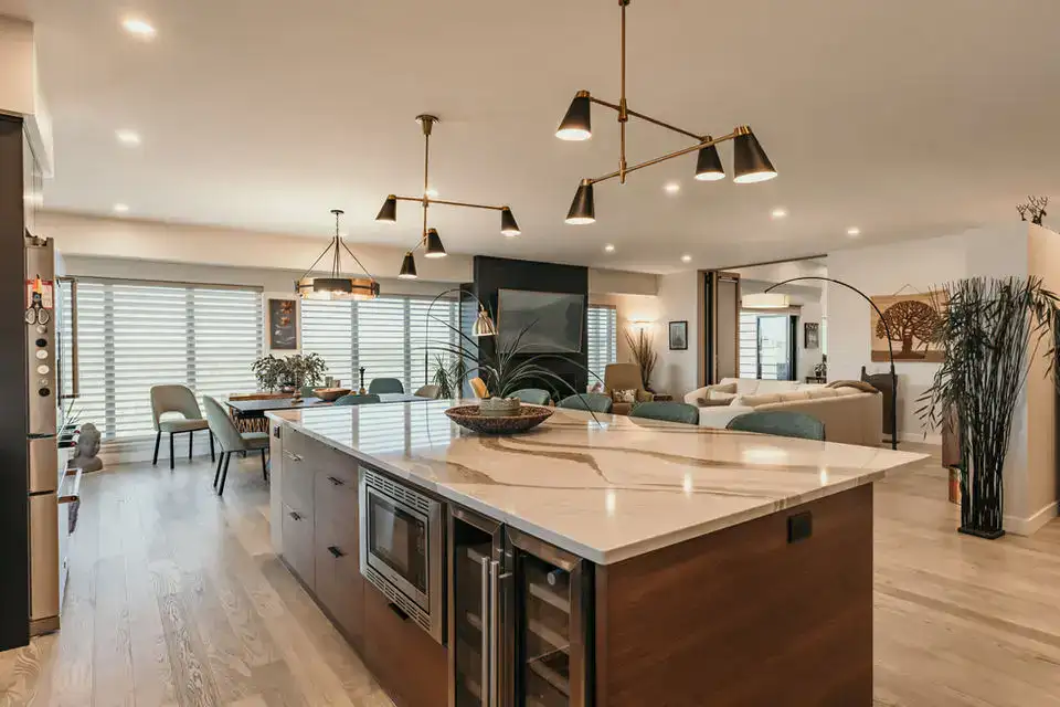 Bright, spacious interior with contemporary furniture and elegant lighting fixtures.